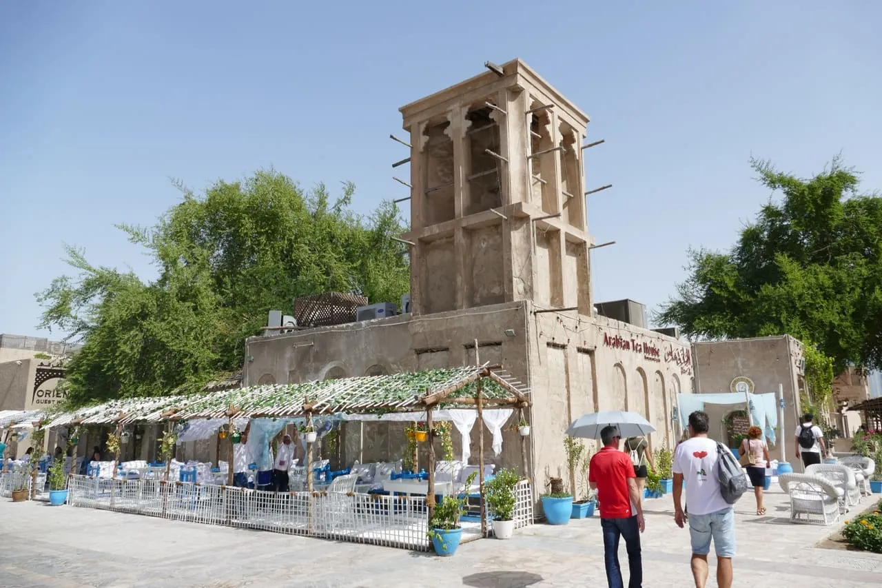 A restored wind tower above a courtyard cafe in Al Fahidi Historical Neighbourhood, Bur Dubai