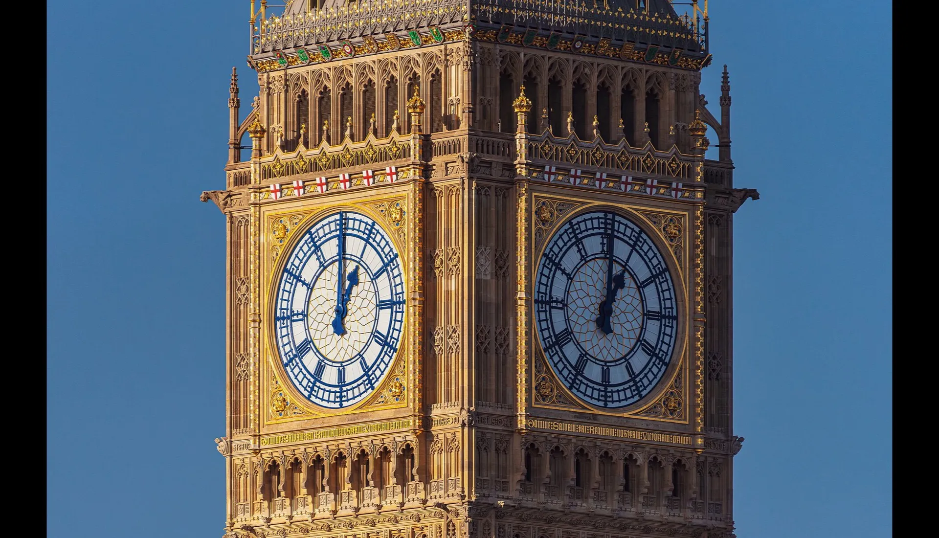 The clock faces of Elizabeth Tower, known as Big Ben, at the Palace of Westminster in London