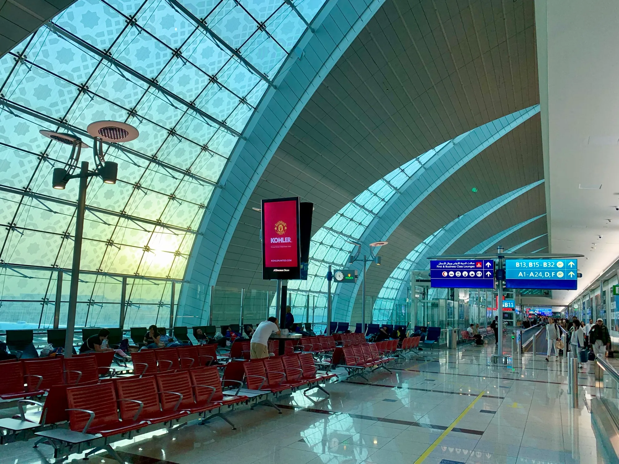 Gate seating and signs to the B, A, D and F Gates in Concourse B of Terminal 3 at Dubai International