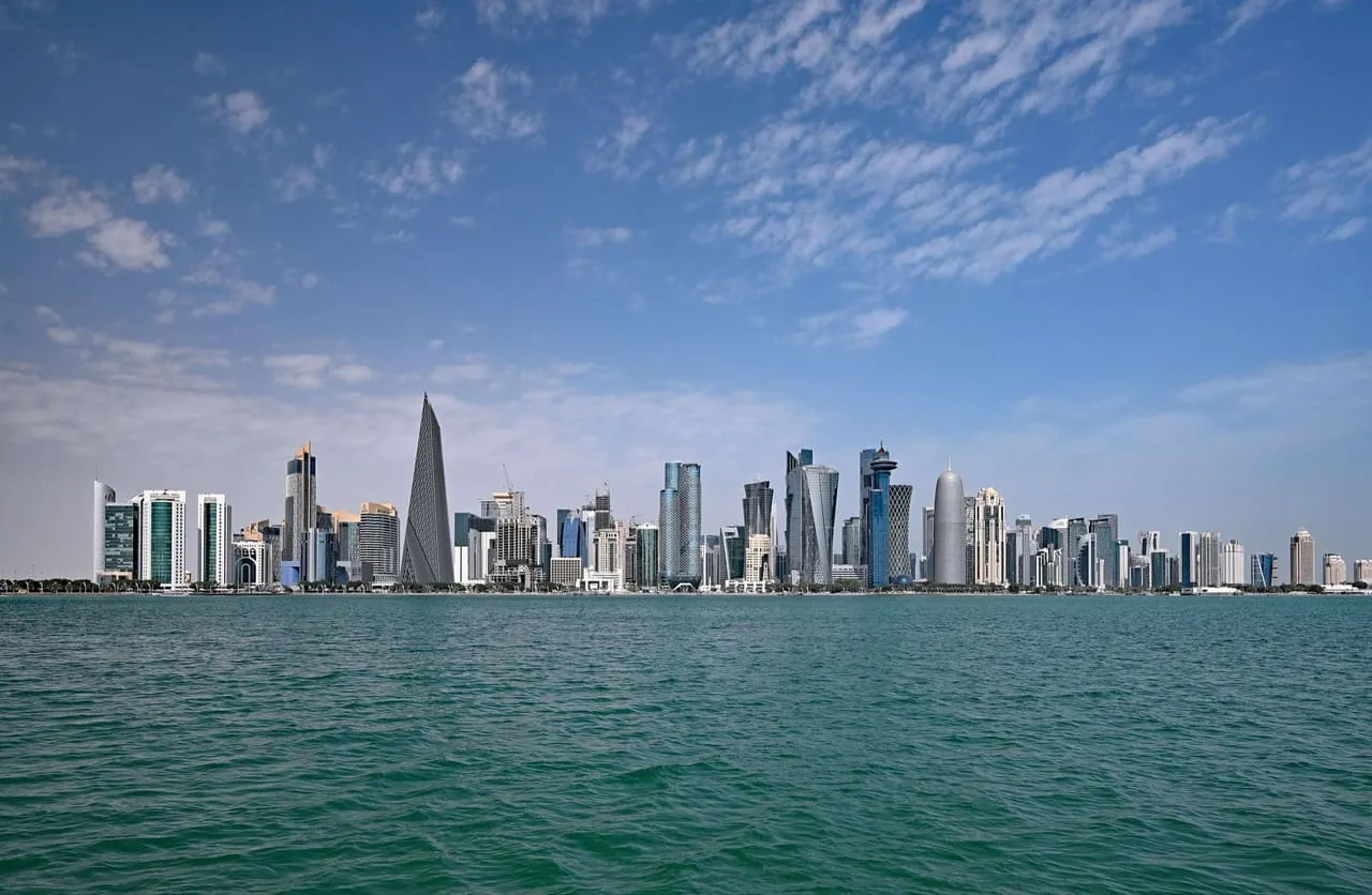 The West Bay skyline in Doha, Qatar, seen across the water of Doha Bay