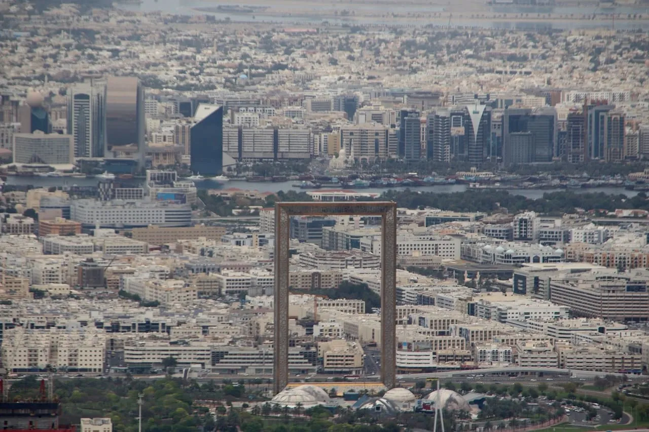 The Dubai Frame in Zabeel Park seen from above, with Bur Dubai, Dubai Creek and Deira behind