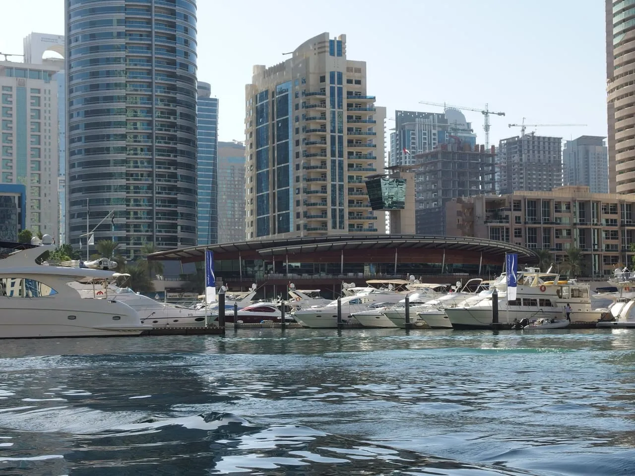 Dubai Marina Yacht Club and its berths, seen from a boat on the marina