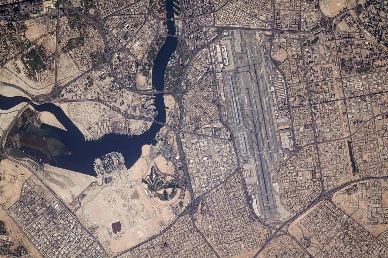 Dubai International Airport and Dubai Creek seen from the International Space Station, with Al Garhoud between them