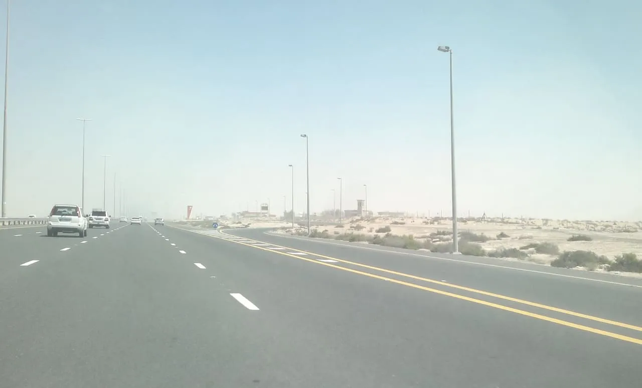 Open desert beside the motorway between Abu Dhabi and Dubai