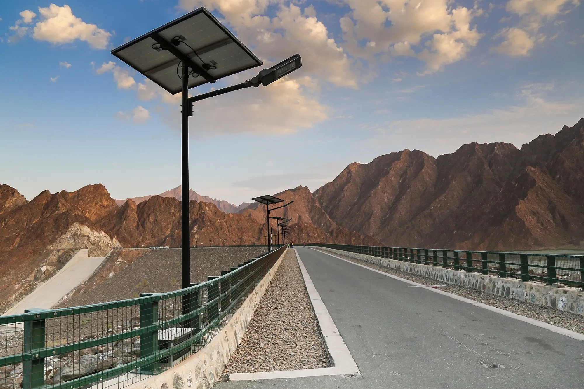 The road across Hatta Dam with the Hajar mountains behind