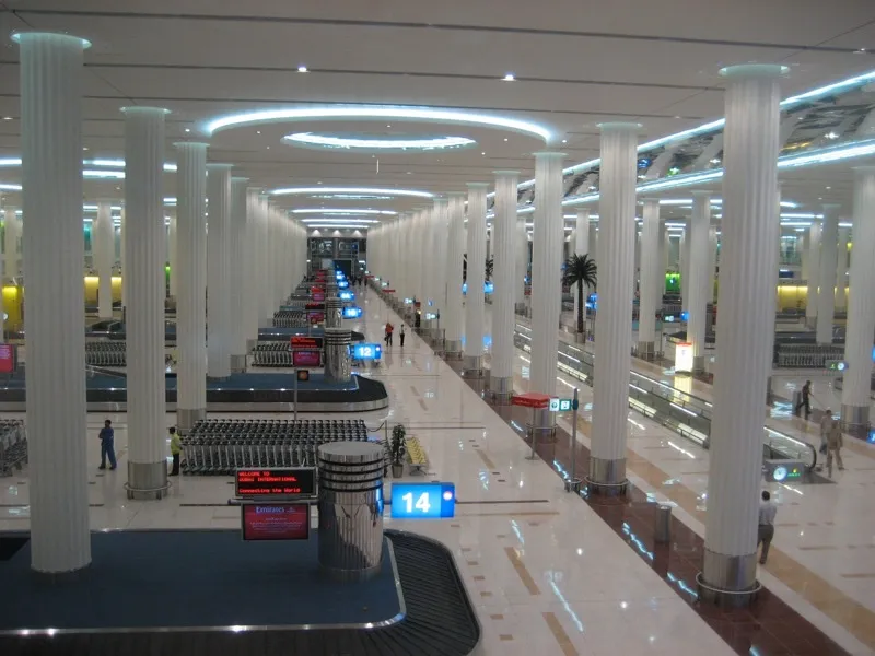Baggage reclaim belts and travelators in the Terminal 3 arrivals hall at Dubai International