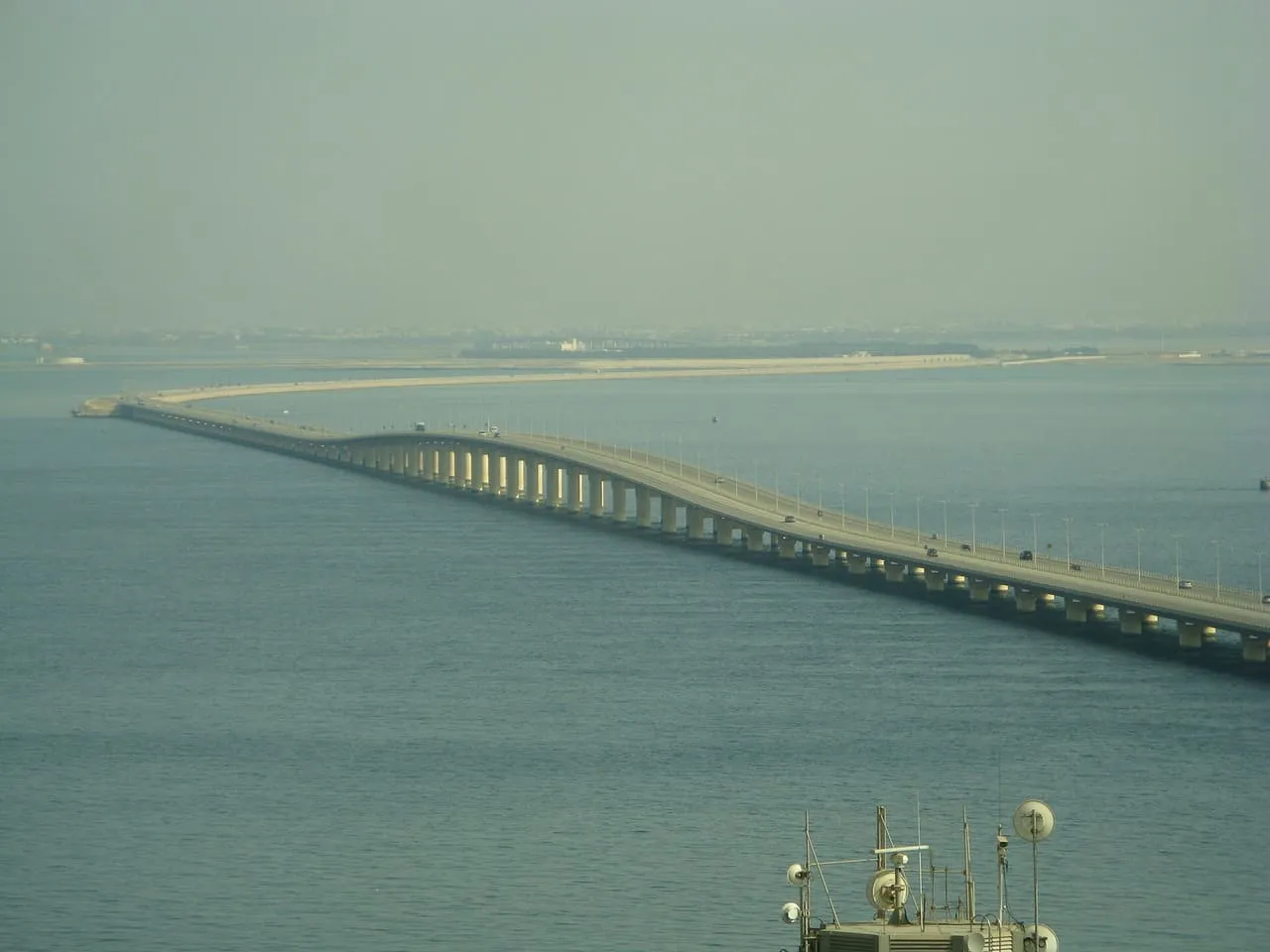 The King Fahd Causeway crossing the sea between Saudi Arabia and Bahrain, with cars on its raised bridge section