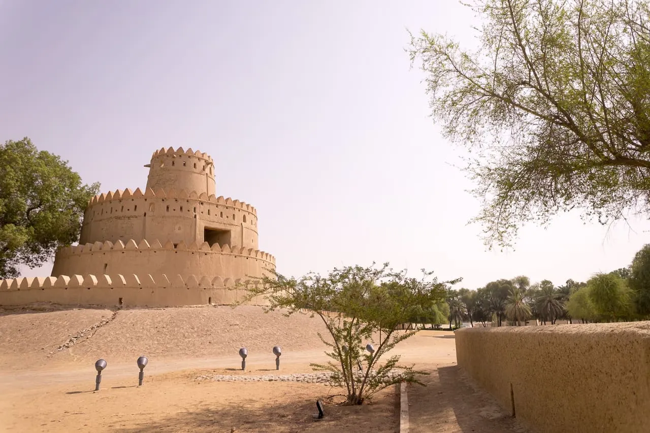 The round mud-brick tower of Al Jahili Fort in Al Ain