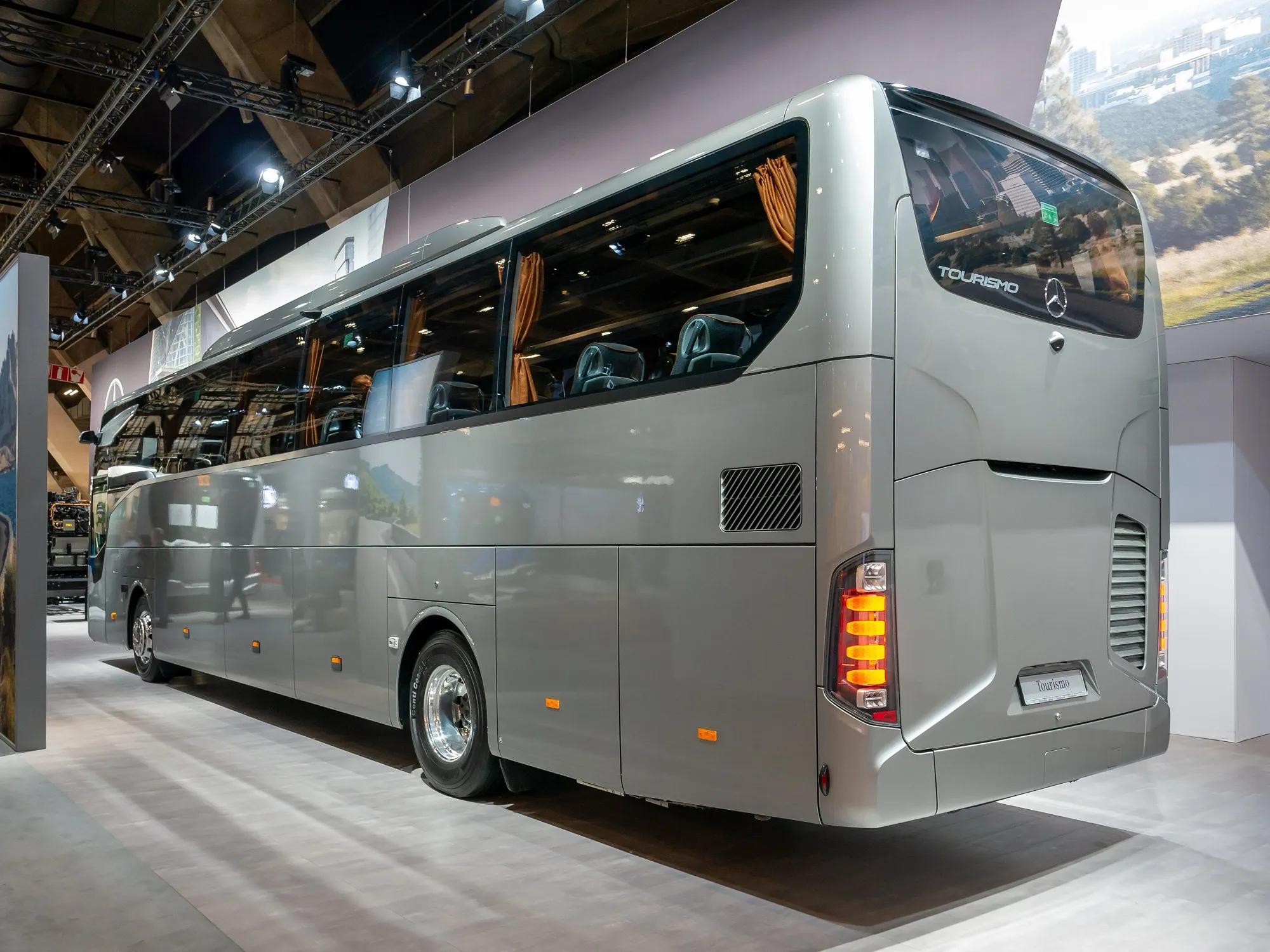 A Mercedes-Benz Tourismo full-size coach, the class of vehicle used for groups of 45 to 50