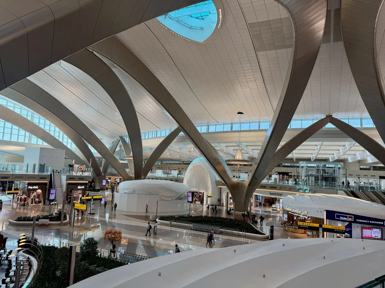 The main hall of Terminal A at Zayed International Airport, Abu Dhabi, under its curved roof arches