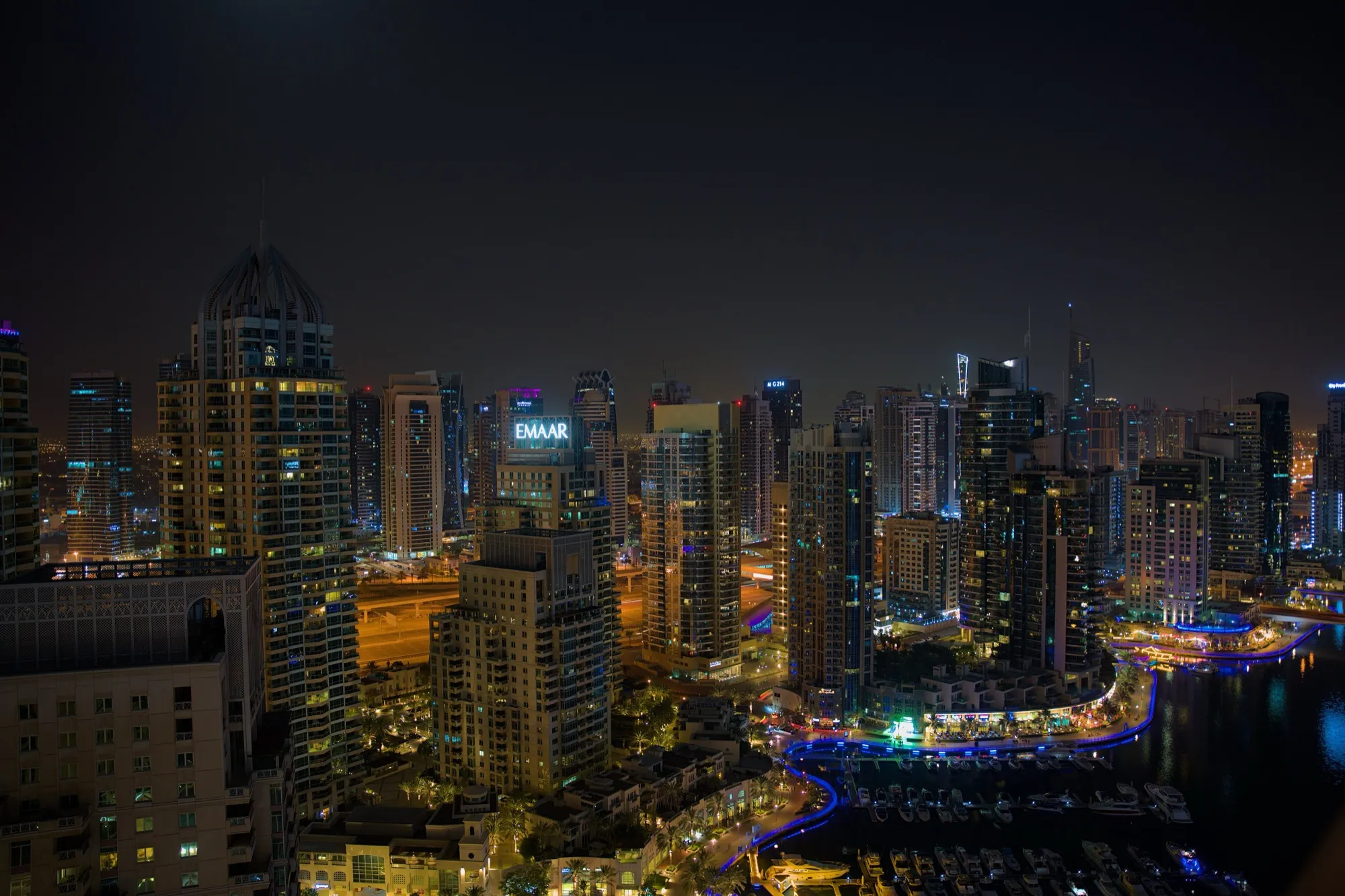 Dubai Marina towers lit up at night, when summer evenings are more comfortable