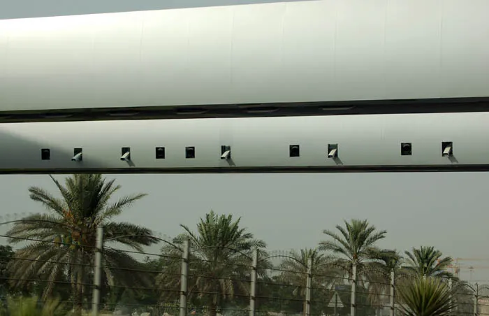 A Salik toll gate gantry with its cameras over the approach to Al Garhoud Bridge in Dubai