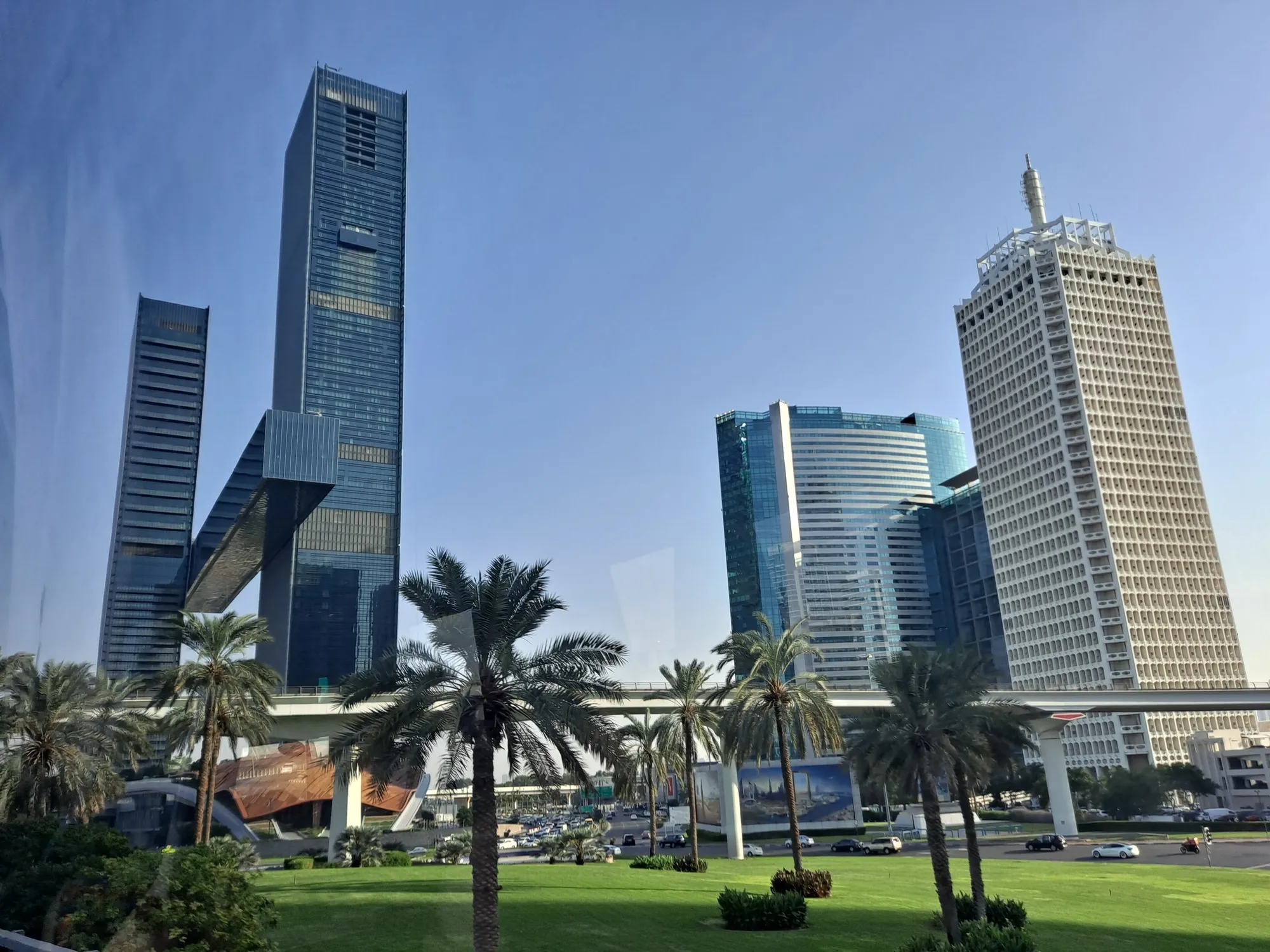 Towers and the Dubai Metro viaduct along Sheikh Zayed Road, the main route from the airport to the Marina