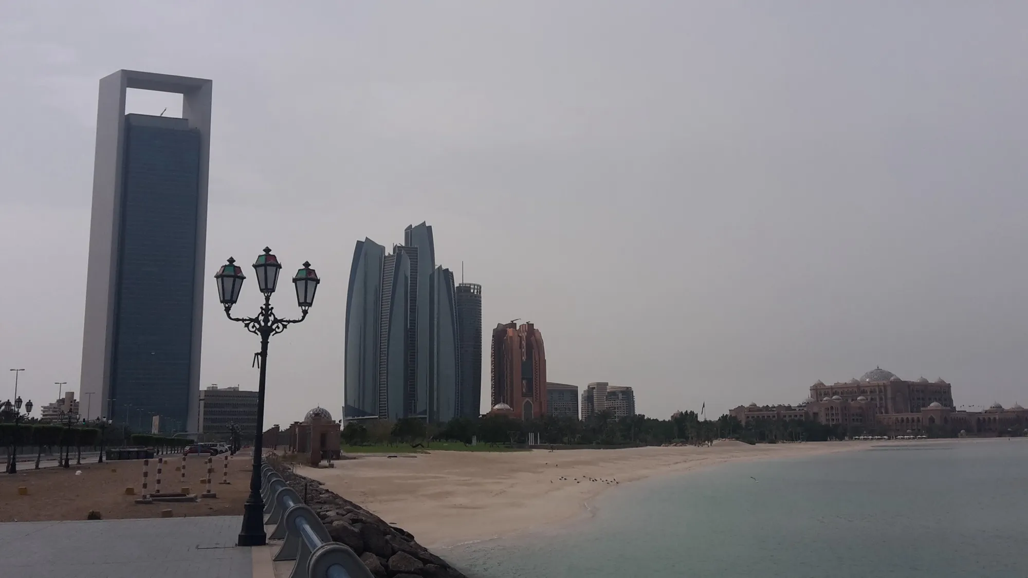 The Abu Dhabi seafront with the Etihad Towers and Emirates Palace on the right