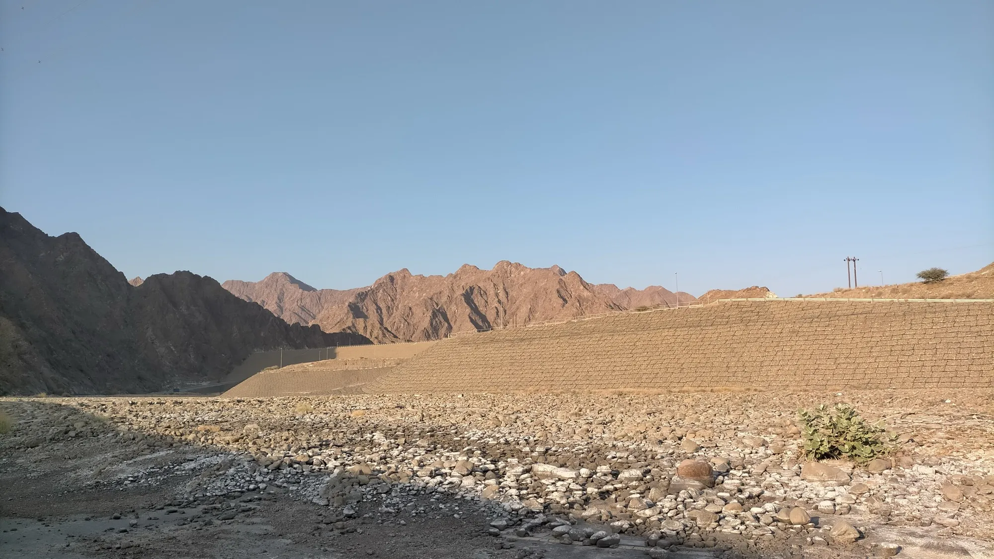 Dry wadi bed below the Wadi Wurayah Dam embankment
